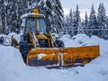 JCB excavator close up in the big snow .