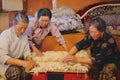 Senior Mongolian women produce felt in Harhorin, Mongolia.