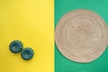 Hari Raya Aidilfitri table setting with traditional table mat and dinnerware with green and yellow background. Royalty Free Stock Photo