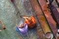 Haridwar, India - March 11, 2017: unidentified people bathing and taking ablutions in the Ganges River at the Holy ghats in Haridw Royalty Free Stock Photo