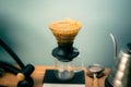 Hario V60 Immersion Dripper preparing coffee on the blurred background Royalty Free Stock Photo