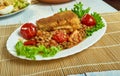 Harissa crumbed fish with lentils Royalty Free Stock Photo