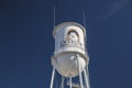 Downtown Harlem Old water tower with art work of Oliver Hardy close up