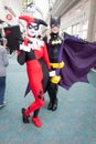 Harlequin and Batgirl at Comic Con Royalty Free Stock Photo