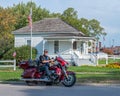 A Harley biker vacationer stops to visit the modest home where John Wayne was born Marion Robert Morrison on May, 26, 1907