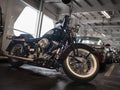 Harley Davidson Motorcycle parked on a ferry. Black Motorcycle engine exhaust pipes