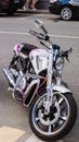 Harley-Davidson motorcycle parked in a public parking area in Moscow. Front side view of legendary motorbike Royalty Free Stock Photo