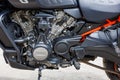 Harley-Davidson Pan America 1250 Motorcycle on parking at spring day, close view of engine