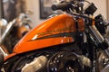 Harley Davidson Sportster Model with orange tank.