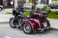 Harley-Davidson Trike Motorcycle parked on street, rear side view Royalty Free Stock Photo