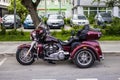 Harley-Davidson Trike Motorcycle parked on street, side view Royalty Free Stock Photo