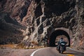 Harley motorbike passing through a tunnel on National Route 7