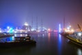 Harlingen, Netherlands - January 09, 2020. Port of Harlingen in fog at night