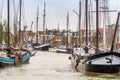 Harlingen, Nethrelands - January 10, 2020. Boats in water canal in downtown in winter