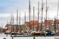 Harlingen, Nethrelands - January 10, 2020. Boats in water canal in downtown in winter