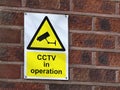 Harlow, England - 13 March 2019. CCTV in operation sign on a wall in the Staple Tye area