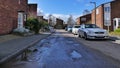 Harlow, England - 13 March 2019. A potholes road leading through a housing estate in the Staple Tye area