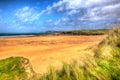 Harlyn Bay beach North Cornwall England UK near Padstow and Newquay in colourful HDR with cloudscape Royalty Free Stock Photo