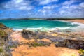 Harlyn Bay North Cornwall England UK near Padstow and Newquay in colourful HDR with cloudscape Royalty Free Stock Photo