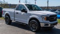Harmar Township, Pennsylvania, USA April 14, 2024 A Ford F150 two door pickup truck for sale at a dealership