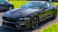 Harmar Township, Pennsylvania, USA April 14, 2024 A used Ford Mustang coupe for sale at a dealership