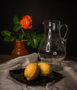 Harmonious Blooms: Roses, Vase, Lemon, and Linen