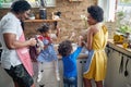 Harmonious Family Moments: Afro-American Parents and Children Bonding in the Kitchen Royalty Free Stock Photo