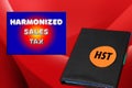 Harmonized sales tax HST memo near folder