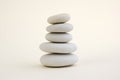 Harmony and balance, cairn, poise stones, rock zen sculpture, three white pebbles