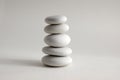 Harmony and balance, cairn, poise stones, rock zen sculpture, three white pebbles