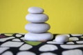 Harmony and balance, cairn, poise stones, rock zen sculpture, three white pebbles Royalty Free Stock Photo