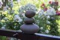 Harmony and balance, cairns, simple poise stones in the garden, rock zen sculpture, dark grey pebbles Royalty Free Stock Photo