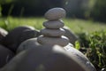 Harmony and balance, cairns, simple poise stones in the garden, rock zen sculpture, white pebbles, single tower Royalty Free Stock Photo