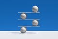 Harmony, balance, equilibrium and stability concepts. Spheres balancing on a seesaw
