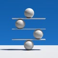 Harmony, balance, equilibrium and stability concepts. Spheres balancing on a seesaw