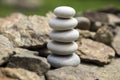 Harmony and balance, simple pebbles tower in another pebbles, simplicity, five stones