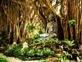 Harmony with Nature: Tranquil Contemplation in the Buddha Garden. Royalty Free Stock Photo