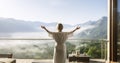 Harmony with Nature - A Woman in a Bathrobe Enraptured by the Expansive Landscape Before Her