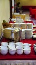 Harmony of White Ceramic Tableware on a Bold Red Restaurant Table Royalty Free Stock Photo