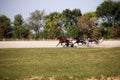 Harness racing horses in fast motion