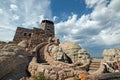 Harney Peak Fire Lookout Tower with Native American prayer flags under cirrus cumulus cloudscape