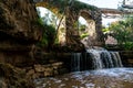 Harod Stream in  Beit She`an Valley. Waterfall and old aqueduct in the eucalyptus grove Royalty Free Stock Photo