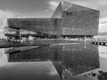 Harpa Operahouse in Reykjavik mirroring in water. Royalty Free Stock Photo