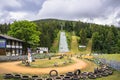 Harrachov,Czech Republic-August 13,2022. Area of three middle ski jumps and fun park close to skicentrum,real attraction for