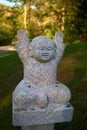 Harrington, QC, Canada - September 23, 2018: Small funny marble figurines in the territory of a Buddhist temple. Every