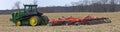 John Deere 9560RT tracked tractor pulling a KUHN 8010 Excelerator XT vertical tillage system