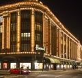 Harrods department store. Ferrari passes in front of the building