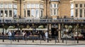 Customers queueing outside the Bettyâs Tea Room and cafe n Harrogate, North Yorkshire