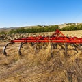 Harrow on the plowed field