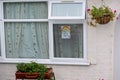 HARROW, UNITED KINGDOM - May 09, 2020: Children\'s drawing on house window with positive messages for the NHS workers during the